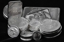 Gold nears all-time highs while silver scores UK record